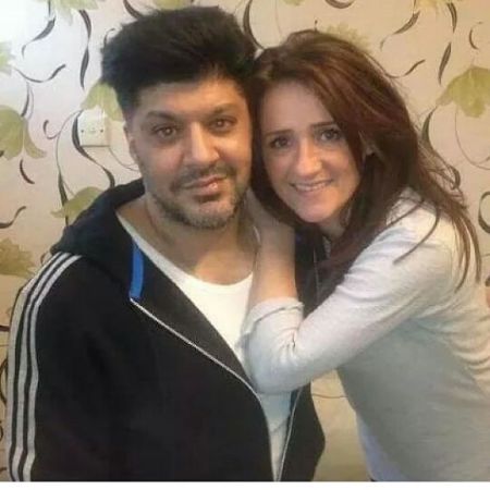 Yaser Malik and his wife, Trisha Malik, took a picture together.